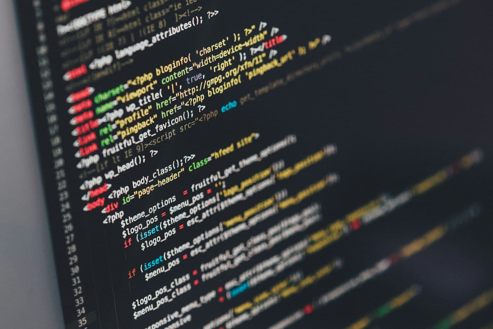 Close-up of syntax-highlighted source code on a monitor